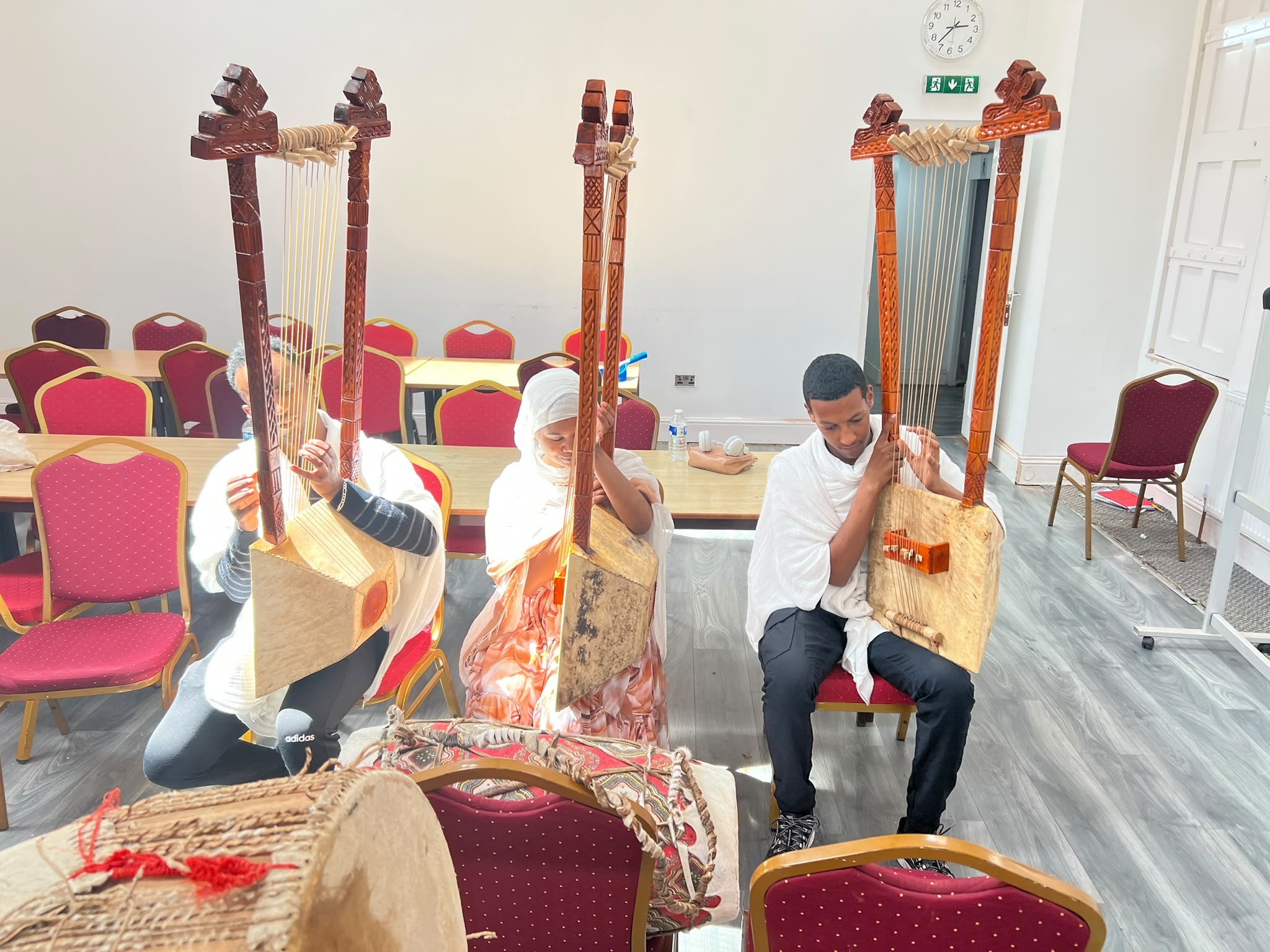 Young people taking part in traditional music activities